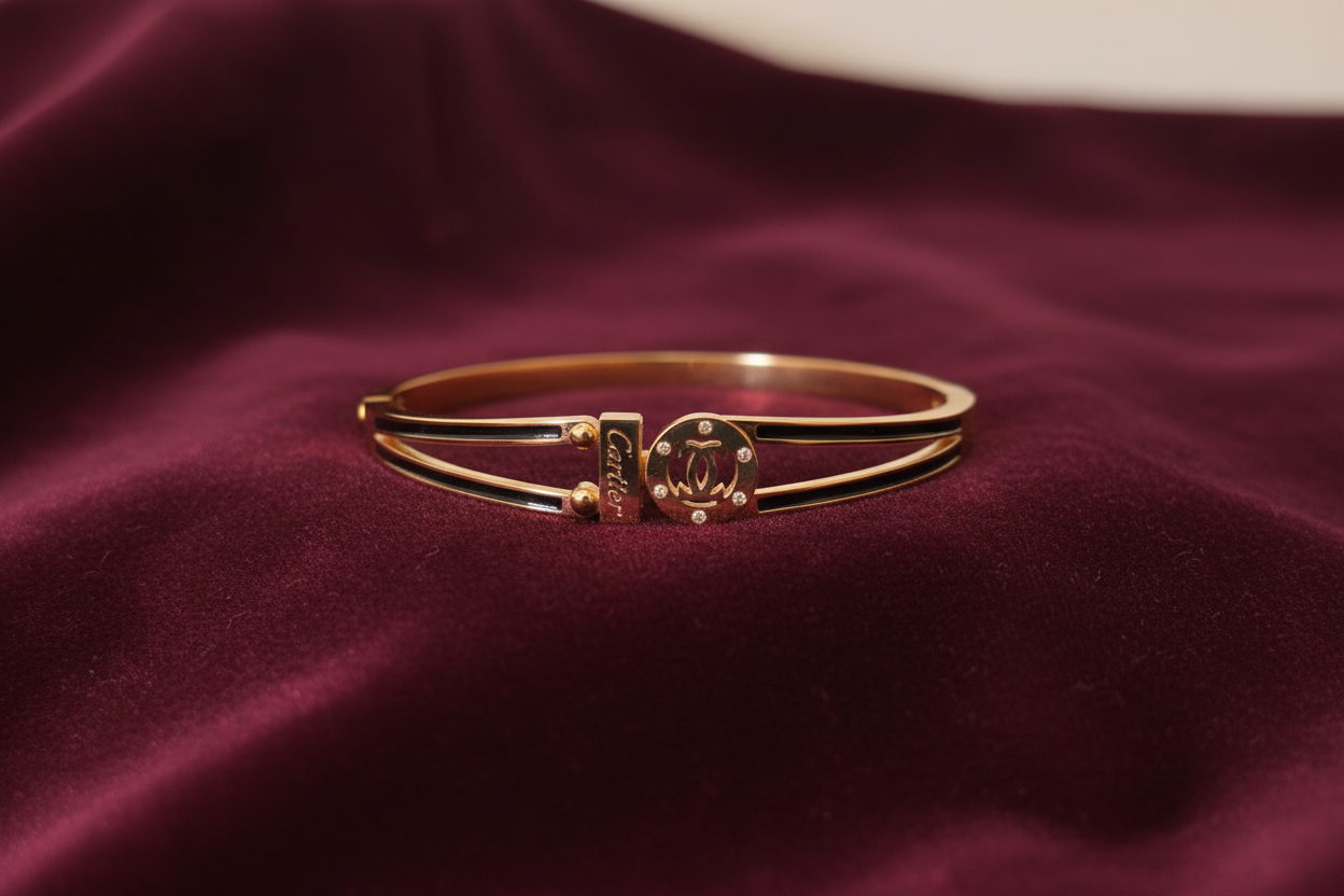 Gold bangle bracelet on velvet background – luxury jewelry