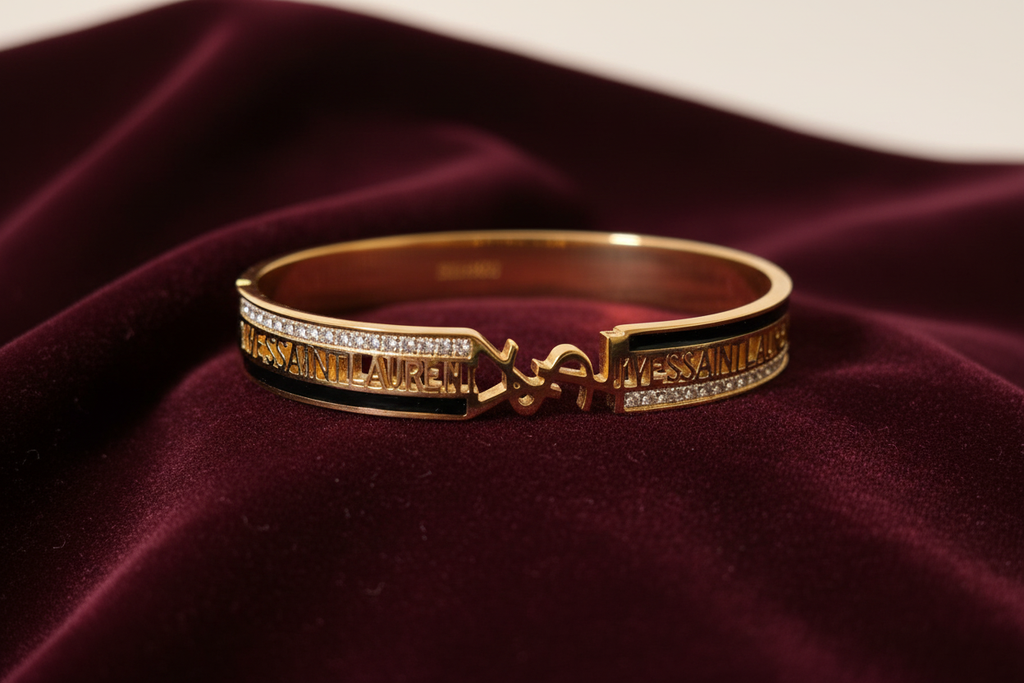 Gold diamond bracelet on burgundy velvet – front view